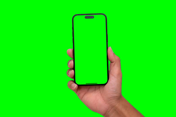 istock Hand holding smart phone Mockup and screen Transparent and Clipping Path isolated for Infographic Business web site design app 1494471241