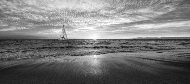 istock Sailboat Sunset Ocean Nature Landscape Black And White Banner 1494472967