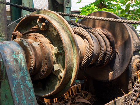 The mechanism of a old and vintage winch.
