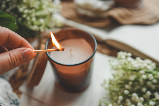 istock Match in hand lighting candles, aesthetics 1494477774