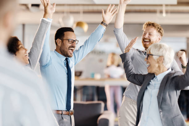 istock Celebrating success in the office! 1494479327