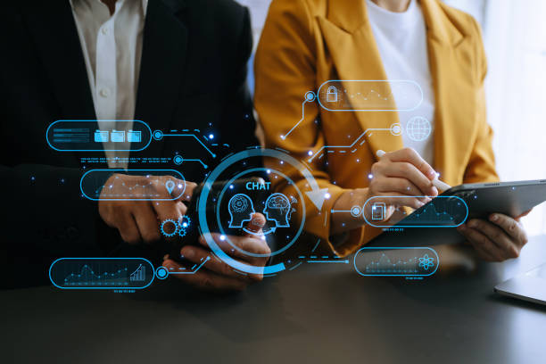 istock Woman and MAn using chat bot in smartphone intelligence Ai. Chat with AI Artificial Intelligence, developed by OpenAI generate. robot in online system. in office 1494480309