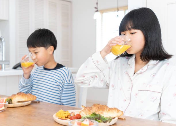 istock children eating breakfast in the dining room 1494480711