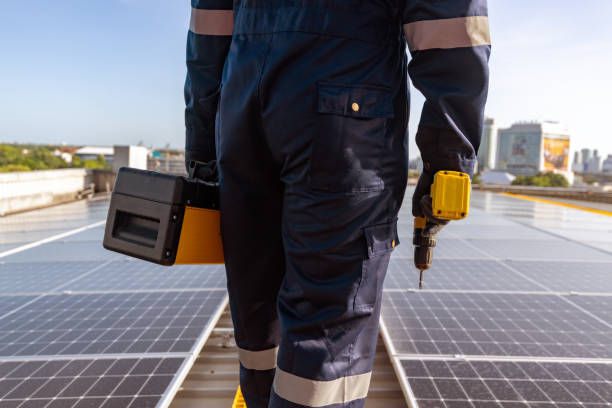 istock Engineers walking on roof inspect check and maintenance solar cell panel by hold equipment and cordless drill ,solar cell is smart grid ecology energy sunlight alternative power factory concept 1494482175