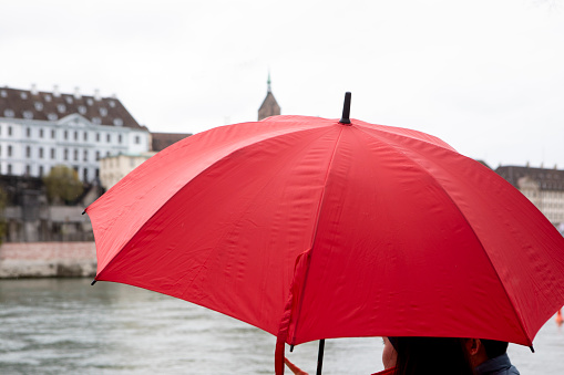 A wet day in April in Altstadt Kleinbasel - part of the old town in Basel, Switzerland, pictured near the River Rhine
