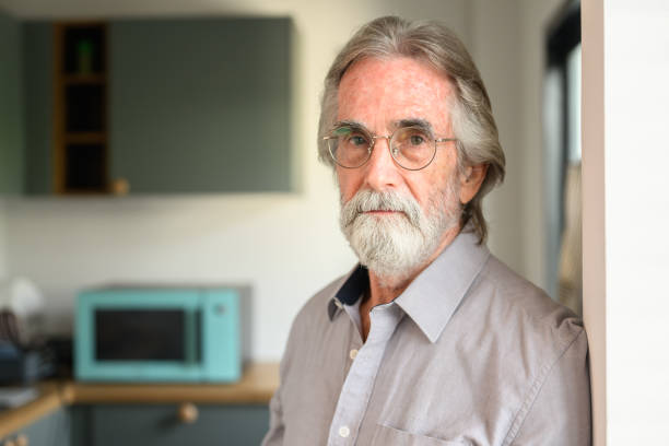 istock Happy senior man with eyeglasses looking at camera portrait 1494494490