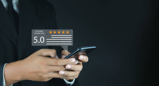 istock Customer or User give rating to service experiences review satisfaction feedback survey on online application, Customer can evaluate quality of service leading to reputation ranking of business. 1494494766