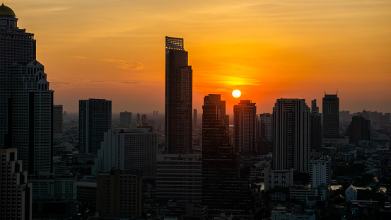 Bangkok skyline at sunset time from a building (Scarlett Wine bar & restaurant), Thailand.