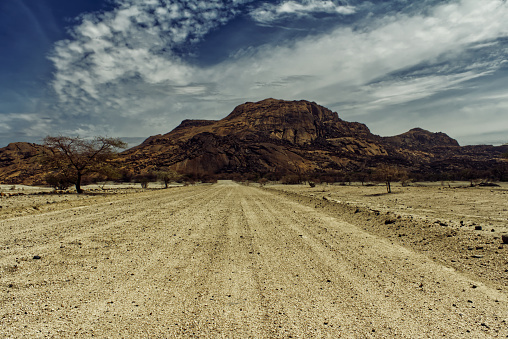 Road leading to the lodge at the foothills of the Erongo Mountain Range in the Erongo Region of Namibia