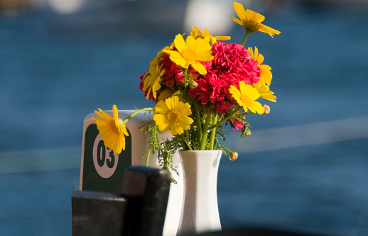 Seafront table number three with flowers