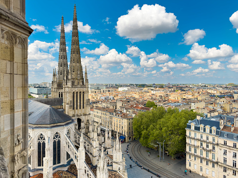 Aerial cityscape view on the old town of Bordeaux city with st Andrew cathedral during a sunny day in France. High quality photography