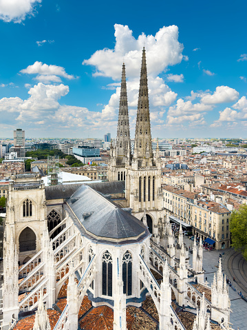 Aerial cityscape view on the old town of Bordeaux city with st Andrew cathedral during a sunny day in France. High quality photography