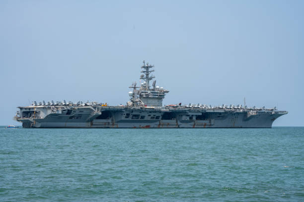 istock Nuclear War Ship, Military navy ship carrier full loading fighter jet aircraft for prepare troops. forwarder mast. Side view of War Ship. 1494508961