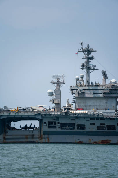 istock Nuclear War Ship, Military navy ship carrier full loading fighter jet aircraft for prepare troops. forwarder mast. Side view of War Ship. 1494508965