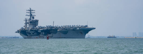 istock Nuclear War Ship, Military navy ship carrier full loading fighter jet aircraft for prepare troops. forwarder mast. Side view of War Ship. 1494508984