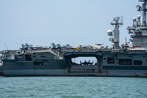 Kanagawa, Japan - June 01, 2022: United States Navy USS Abraham Lincoln (CVN-72), Nimitz-class aircraft carrier sailing in Tokyo bay.