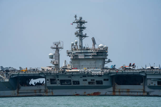 istock Nuclear War Ship, Military navy ship carrier full loading fighter jet aircraft for prepare troops. forwarder mast. Side view of War Ship. 1494509031