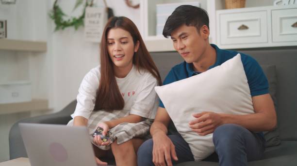istock Couple online shopping. 1494510787