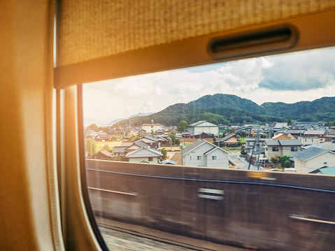 View from Train window countryside scene Railway Travel ride Journey