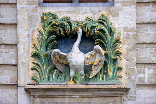 Brussels, Belgium - May 17, 2023: Facade of medieval tenement House of the Corporation of Butchers, called The Swan. It is one of magnificent halls of the former Brussels guilds in Grand Place