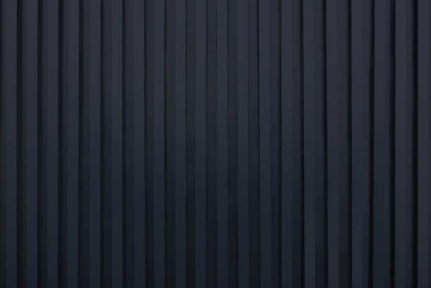 istock black metal siding fence striped background 1494513150