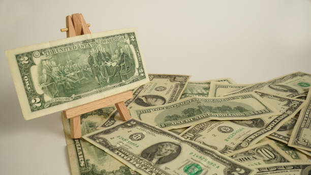 istock Dollars on a table. Concept finance wealth. 1494513824