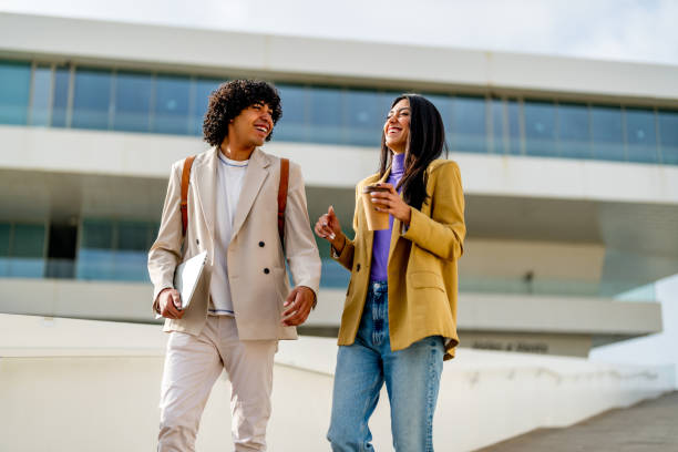 istock Handsome Couple Walking Home From Work In Street 1494515242