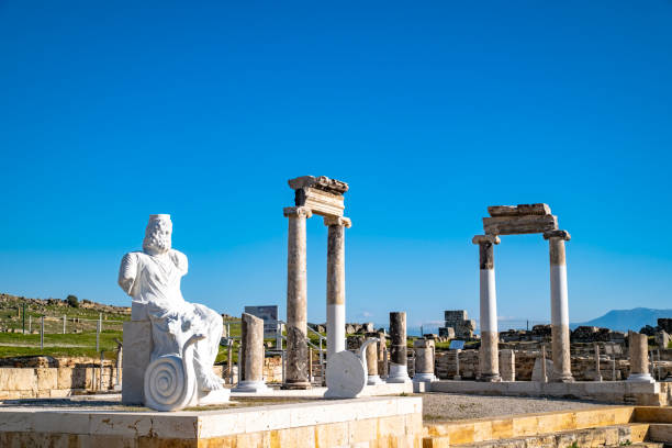 Hades statue sitting on top of the 2,000-year-old ancient city of Hierapolis stock photo