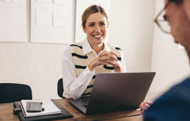 istock Female hiring manager interviewing a job candidate in her office 1494517550