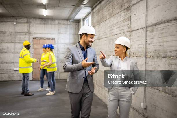 Contractor Tour Guide Contractor And Interior Designer Visiting Construction Site And ...