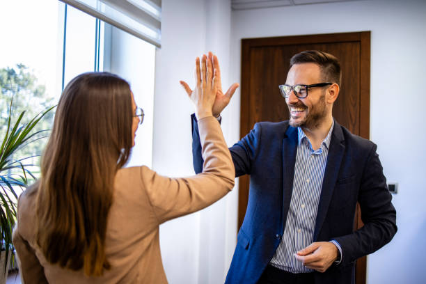 istock Business colleagues achieving goals and celebrating success. 1494519311