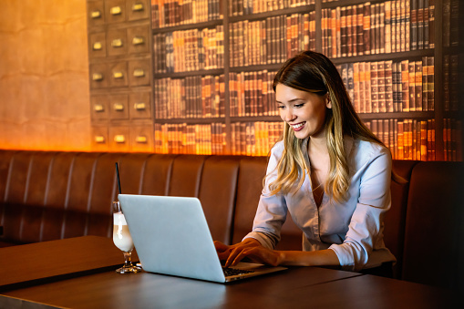 Portrait of happy beautiful successful business woman, manager working. Business people technology concept