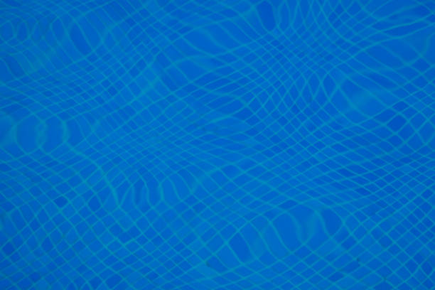 Wavy water surface in the swimming pool. Buildings/Landmarks Sports/Recreation  Parks/Outdoor pseudanthias pleurotaenia stock pictures, royalty-free photos & images