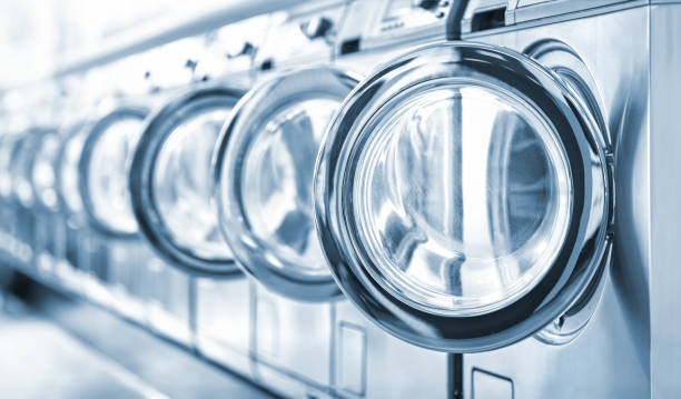 istock Washing machines in a public laundromat 1494524416