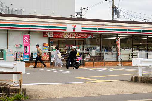 April 29, 2023 in Kyoto, Japan: Front of a 7-Eleven convenience store.