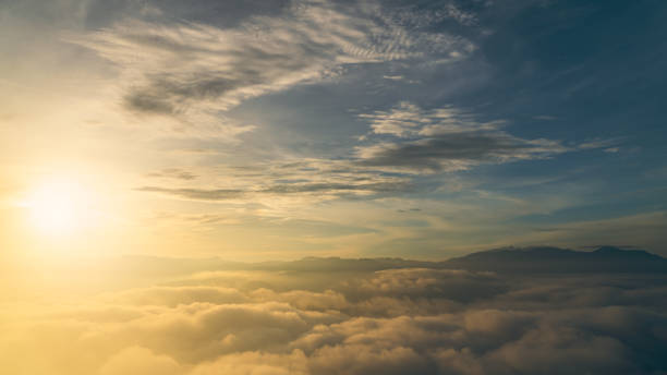 istock Sunset sky clouds over mountain landscape in the morning 1494524904