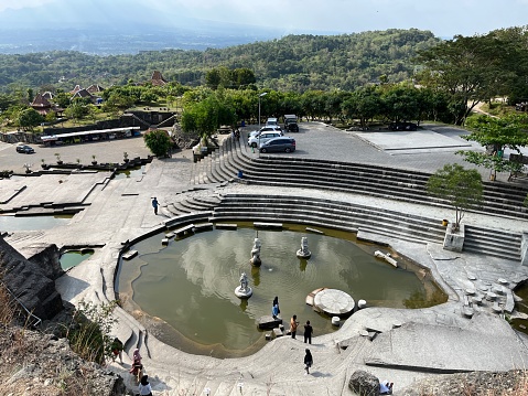 Yogyakarta, Indonesia - May 30, 2023: Tourism area around Tebing Breksi or Breksi Cliff which is a former limestone mining area that transformed into a tourism area with many facility