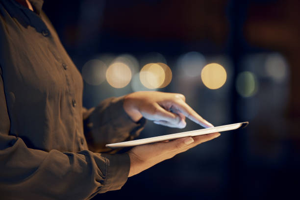 istock Tablet scroll, hands and night woman typing data analysis, business feedback report or customer experience insight. Brand monitoring ui, social media research or worker review of system app analytics 1494531581