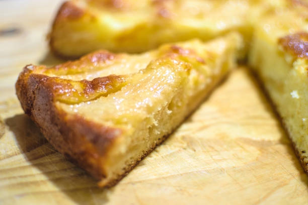istock Freshly made Apple Cake sliced in wooden background. 1494531753