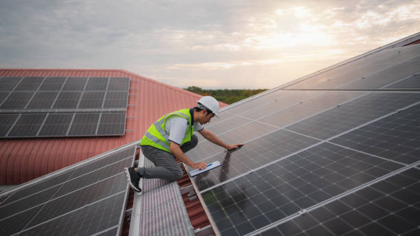 istock Service engineer checking solar cell on the roof for maintenance if there is a damaged part. Engineer worker install solar panel. Clean energy concept. 1494534466