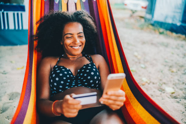 istock Woman in hammock is shopping online 1494534746