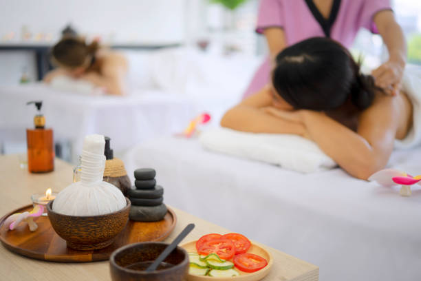 Pretty women spend time at resort and spa hotel. Travel and leisure activity concept.