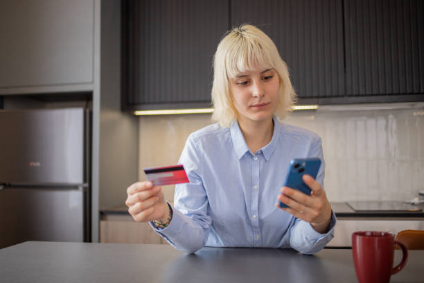 istock Happy young customer enjoys shopping online 1494538613