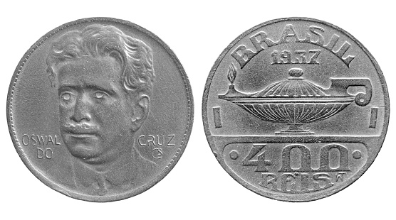 Brazilian silver coin of 400 réis front and back from the year 1937. Oswaldo Cruz, Brazilian scientist, doctor, bacteriologist. Lighted lamp, symbol of nursing, reference to Florence Nightingale.