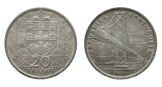 Portuguese silver coin of 20 Escudos from 1966. Commemoration of the opening of the Salazar bridge over the Tagus River in Lisbon. Portuguese Republic. Coat of arms of Portugal.