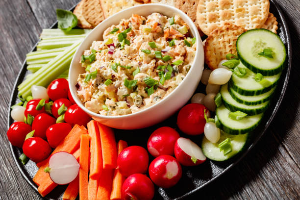 istock salmon salad with fresh veggies and crackers 1494546251