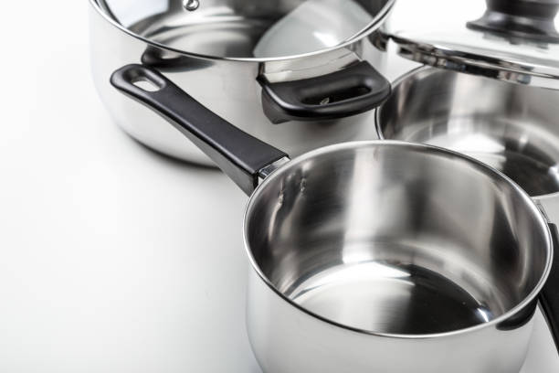 istock Stainless steel pots and pans isolated on white 1494548737