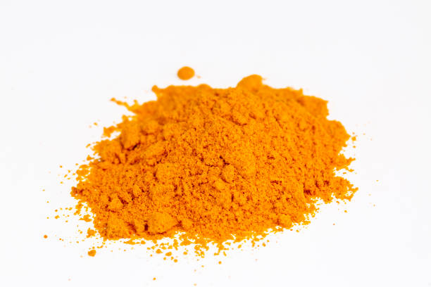 istock Turmeric powder isolated on white background. 1494549251