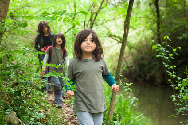 istock Brothers Adventure by the Stream 1494551345