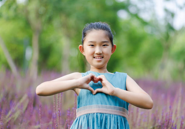 istock Litter Girl Making Heart Shaped 1494553391